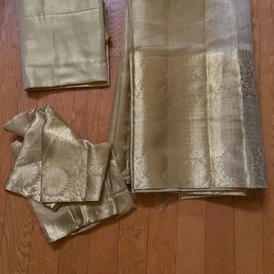 Full gold saree with blouse and shiny skirt